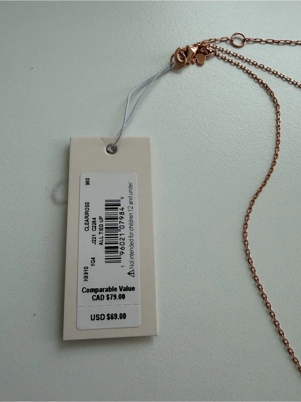 Kate Spade rose gold bow necklace